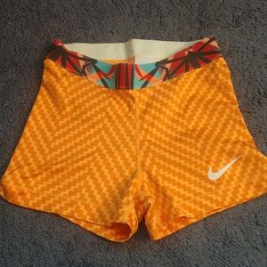 Orange Nike Pro Spandex Shorts